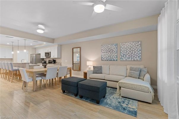 Dining room, Interior, Kitchen, Living room, Pendant Lights, Recessed Lighting, Stainless Steel Appliances, Wood Texture Flooring