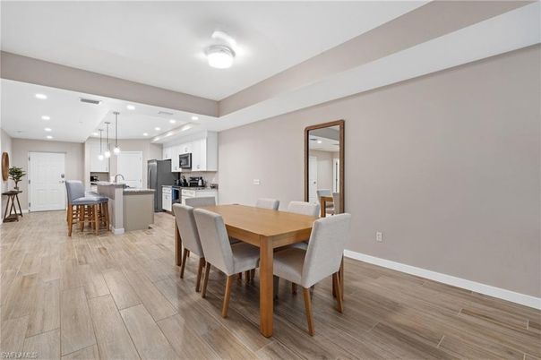 Dining room, Interior, Kitchen, Pendant Lights, Recessed Lighting, Stainless Steel Appliances, Wood Texture Flooring