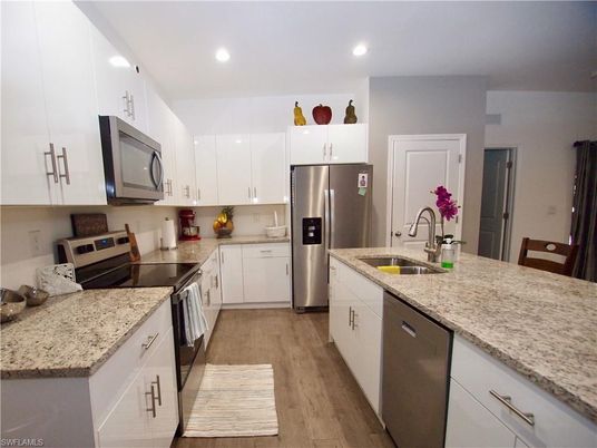 Interior, Kitchen, Recessed Lighting, Stainless Steel Appliances, Wood Texture Flooring