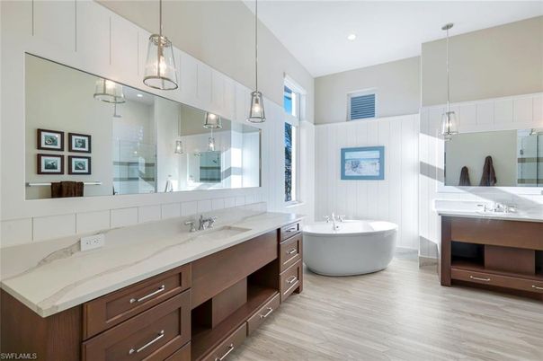 Bathroom, Dual Sink Vanities, Free Standing Baths, Interior, Pendant Lights, Recessed Lighting, Wood Texture Flooring