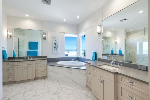 Bathroom, Dual Sink Vanities, Interior, Marble, Marble Walls, Recessed Lighting