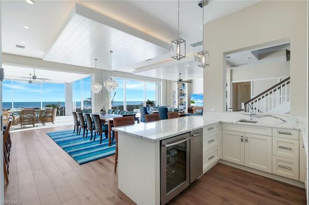 Chandelier, Dining room, Interior, Kitchen, Pendant Lights, Recessed Lighting, Water, Wood Texture Flooring