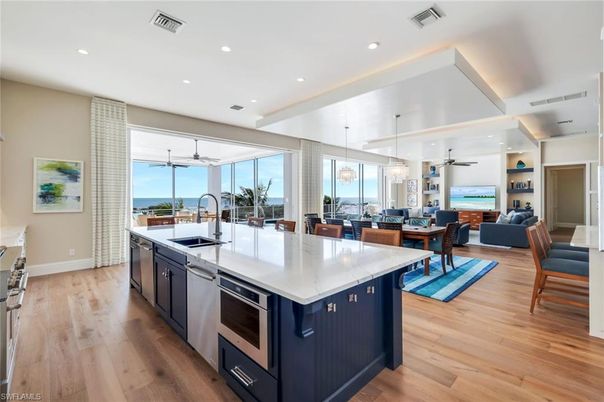 Dining room, Interior, Kitchen, Living room, Pendant Lights, Recessed Lighting, Stainless Steel Appliances, Wood Texture Flooring