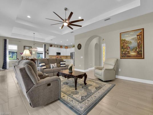 Chandelier, Interior, Kitchen, Living room, Pendant Lights, Recessed Lighting, Stainless Steel Appliances, Wood Texture Flooring