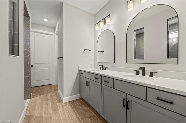 Bathroom, Dual Sink Vanities, Interior, Recessed Lighting, Wood Texture Flooring
