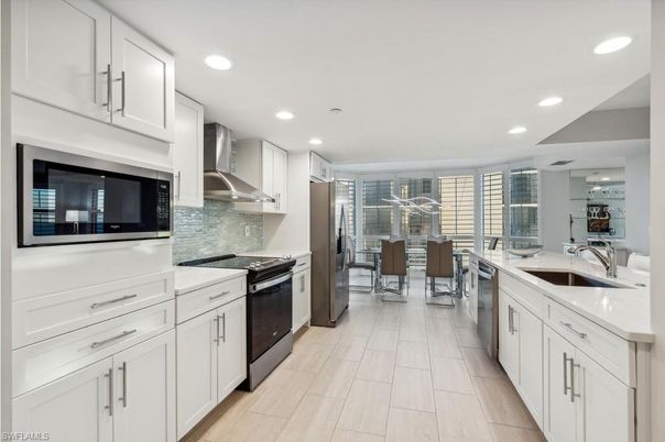 Dining room, Interior, Kitchen, Recessed Lighting, Stainless Steel Appliances, Wood Texture Flooring
