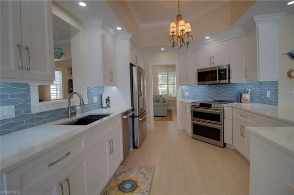 Chandelier, Interior, Kitchen, Recessed Lighting, Stainless Steel Appliances, Wood Texture Flooring