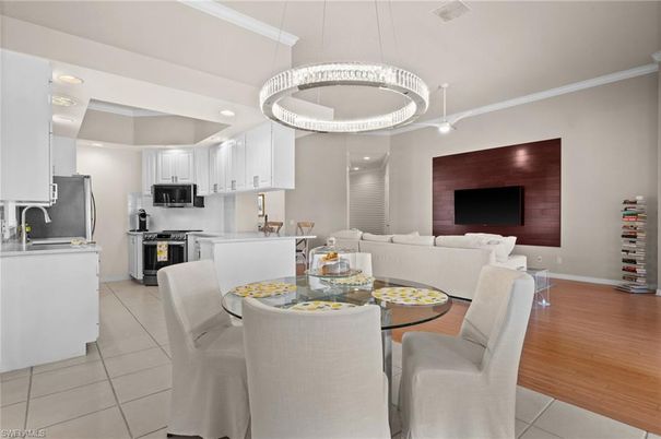 Dining room, Interior, Kitchen, Living room, Pendant Lights, Recessed Lighting, Stainless Steel Appliances, Wood Texture Flooring