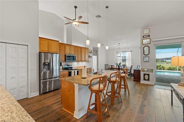Dining room, Interior, Kitchen, Pendant Lights, Stainless Steel Appliances, Wood Texture Flooring