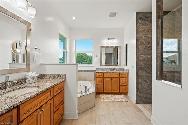 Bathroom, Dual Sink Vanities, Interior, Recessed Lighting, Wood Texture Flooring