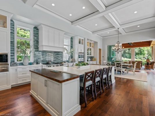 Chandelier, Dining room, Interior, Kitchen, Recessed Lighting, Stainless Steel Appliances, Wood Texture Flooring