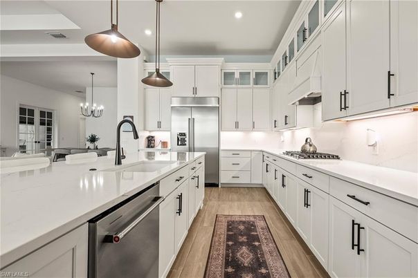 Chandelier, Interior, Kitchen, Pendant Lights, Recessed Lighting, Stainless Steel Appliances, Wood Texture Flooring
