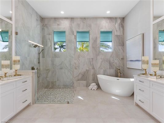 Bathroom, Dual Sink Vanities, Free Standing Baths, Glass Shower, Interior, Marble Walls, Recessed Lighting