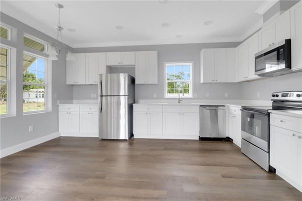 Interior, Kitchen, Pendant Lights, Stainless Steel Appliances, Wood Texture Flooring