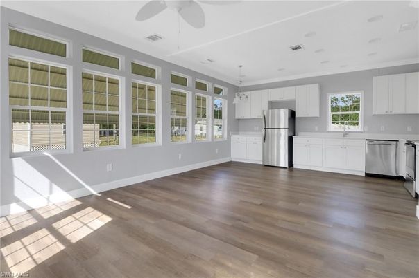Interior, Kitchen, Pendant Lights, Stainless Steel Appliances, Wood Texture Flooring