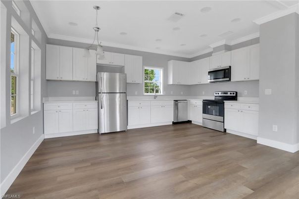Interior, Kitchen, Pendant Lights, Recessed Lighting, Stainless Steel Appliances, Wood Texture Flooring