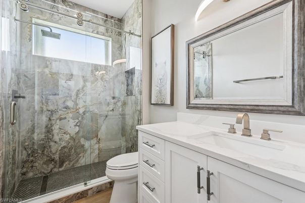 Bathroom, Glass Shower, Interior, Marble Walls, Wood Texture Flooring