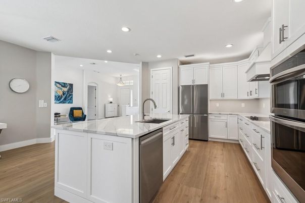 Interior, Kitchen, Pendant Lights, Recessed Lighting, Stainless Steel Appliances, Wood Texture Flooring