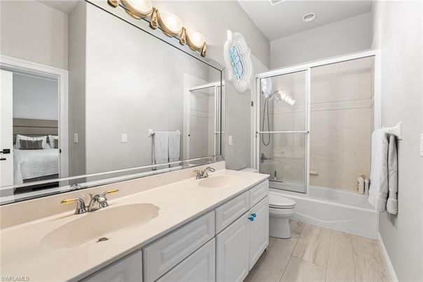 Bathroom, Bedroom, Dual Sink Vanities, Glass Shower, Interior, Recessed Lighting, Wood Texture Flooring
