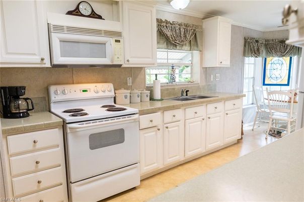 Dining room, Interior, Kitchen, Tile Countertops, Wood Texture Flooring
