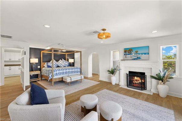 Bedroom, Fireplace, Interior, Recessed Lighting, Wood Texture Flooring