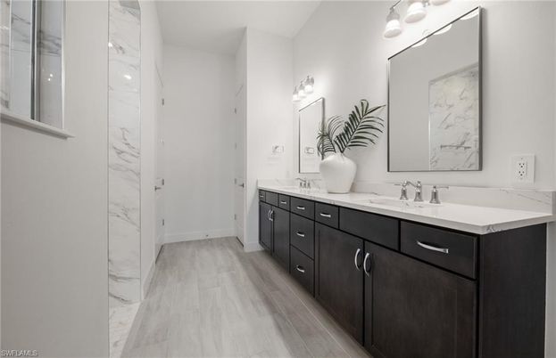 Bathroom, Dual Sink Vanities, Interior, Marble, Marble Walls, Wood Texture Flooring