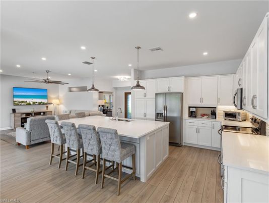 Interior, Kitchen, Living room, Pendant Lights, Recessed Lighting, Stainless Steel Appliances, Wood Texture Flooring