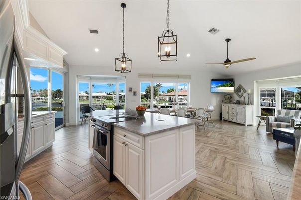 Dining room, Interior, Kitchen, Living room, Pendant Lights, Recessed Lighting, Wood Texture Flooring