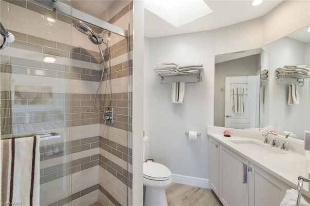 Bathroom, Glass Shower, Interior, Recessed Lighting, Wood Texture Flooring