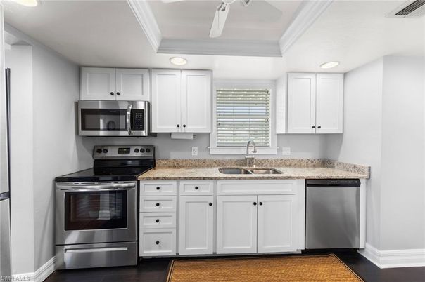 Interior, Kitchen, Recessed Lighting, Stainless Steel Appliances, Wood Texture Flooring