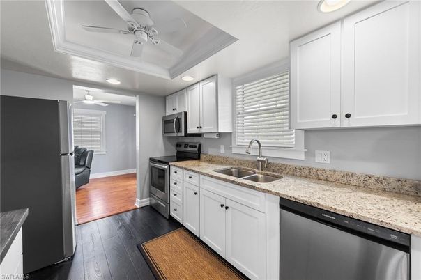 Interior, Kitchen, Recessed Lighting, Stainless Steel Appliances, Wood Texture Flooring