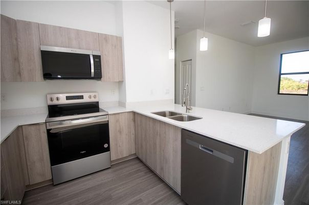 Interior, Kitchen, Pendant Lights, Stainless Steel Appliances, Wood Texture Flooring