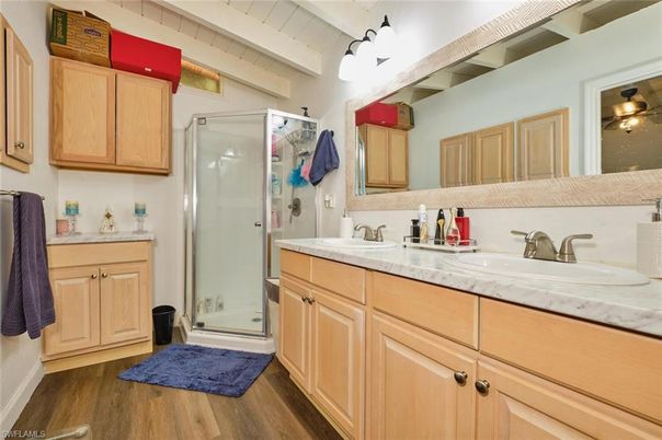 Bathroom, Dual Sink Vanities, Glass Shower, Interior, Wood Texture Flooring
