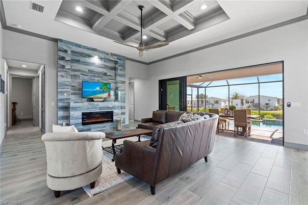 Dining room, Fireplace, Interior, Living room, Pendant Lights, Recessed Lighting, Stone Walls, Wood Texture Flooring