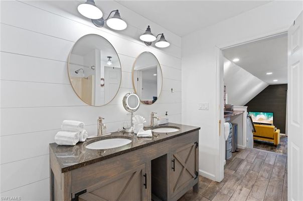 Bathroom, Dual Sink Vanities, Interior, Recessed Lighting, Wood Texture Flooring