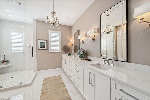 Bathroom, Chandelier, Dual Sink Vanities, Glass Shower, Interior, Marble, Recessed Lighting