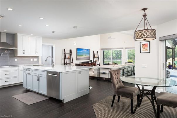 Dining room, Interior, Kitchen, Living room, Pendant Lights, Recessed Lighting, Stainless Steel Appliances, Wood Texture Flooring