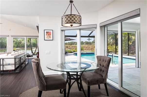 Dining room, Interior, Pendant Lights, Pool, Wood Texture Flooring