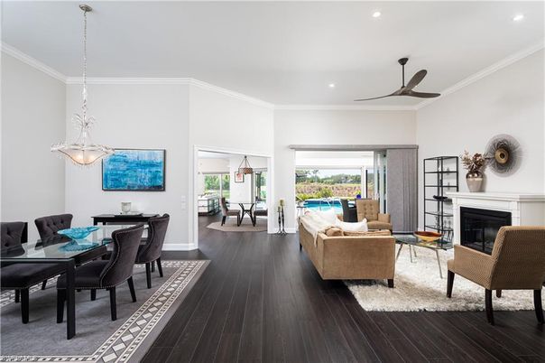 Dining room, Fireplace, Interior, Living room, Pendant Lights, Recessed Lighting, Wood Texture Flooring