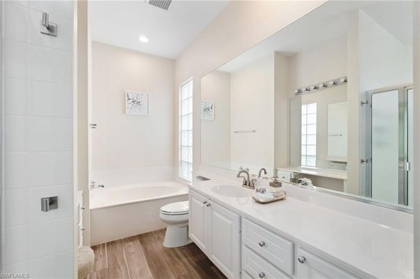Bathroom, Dual Sink Vanities, Interior, Recessed Lighting, Wood Texture Flooring