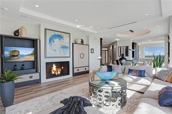 Dining room, Fireplace, Interior, Living room, Recessed Lighting, Wood Texture Flooring