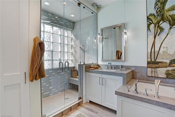 Bathroom, Dual Sink Vanities, Glass Shower, Interior, Recessed Lighting, Wood Texture Flooring