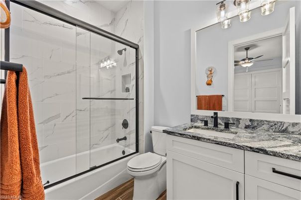 Bathroom, Glass Shower, Interior, Marble Walls, Wood Texture Flooring