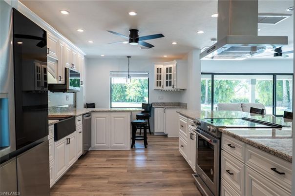 Interior, Kitchen, Pendant Lights, Recessed Lighting, Stainless Steel Appliances, Wood Texture Flooring