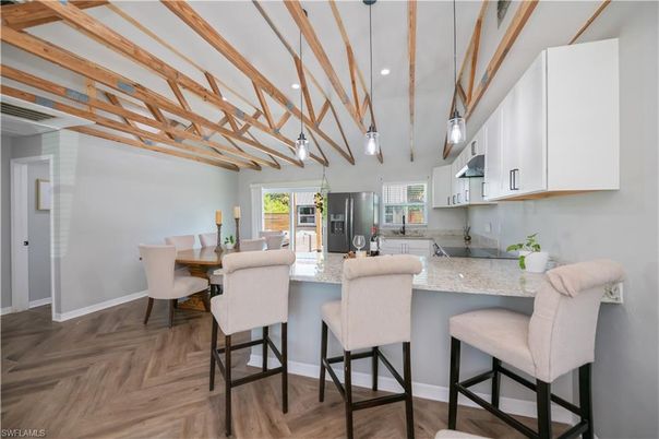 Dining room, Interior, Kitchen, Pendant Lights, Recessed Lighting, Stainless Steel Appliances, Wooden Beams, Wood Texture Flooring