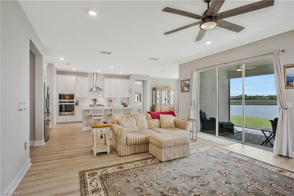Interior, Kitchen, Living room, Recessed Lighting, Stainless Steel Appliances, Water, Wood Texture Flooring
