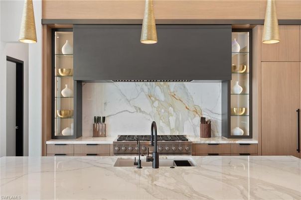 Interior, Kitchen, Marble Walls, Pendant Lights, Stainless Steel Appliances
