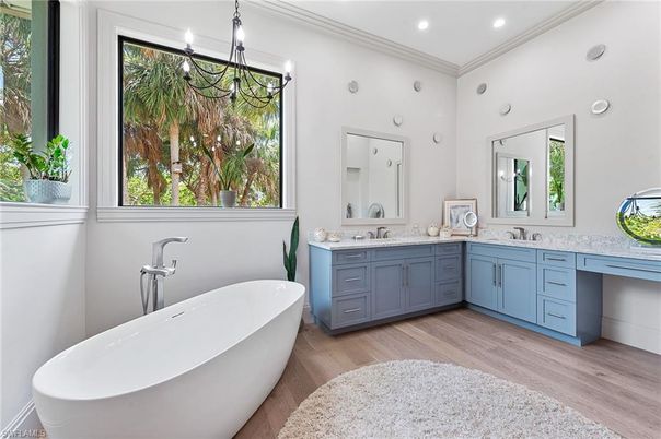 Bathroom, Chandelier, Dual Sink Vanities, Free Standing Baths, Interior, Recessed Lighting, Wood Texture Flooring