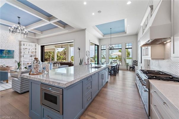 Chandelier, Interior, Kitchen, Pendant Lights, Recessed Lighting, Stainless Steel Appliances, Wood Texture Flooring