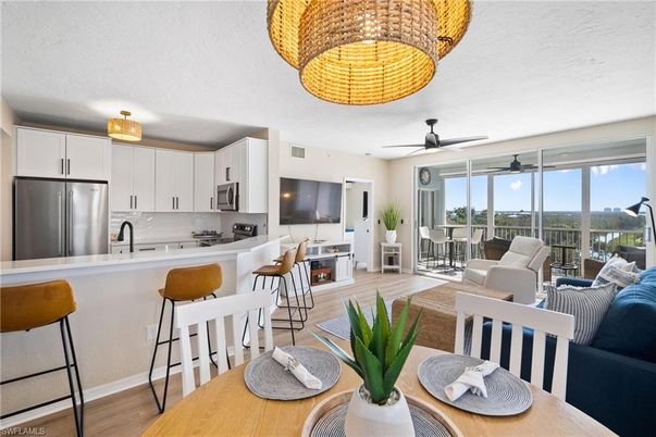 Dining room, Interior, Kitchen, Living room, Stainless Steel Appliances, Wood Texture Flooring